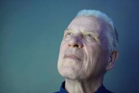 Dreamily looking man 库存照片