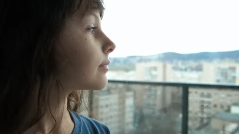 Dreaming child at the window Stock Footage 252151820