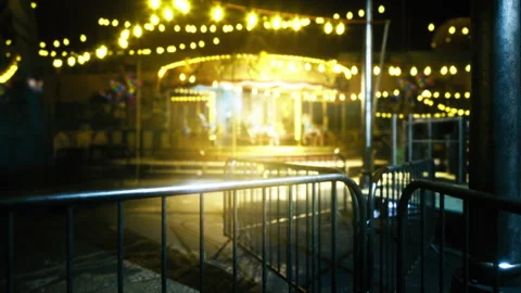 Dreamlike carousel glow. Gentle flickering lights cast enchanting reflections Stock-Footage 341826807