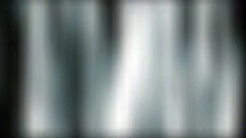 Dreamlike glowing vertical light streaks flowing through soft blurred atmosphere Stock-Footage 339749158