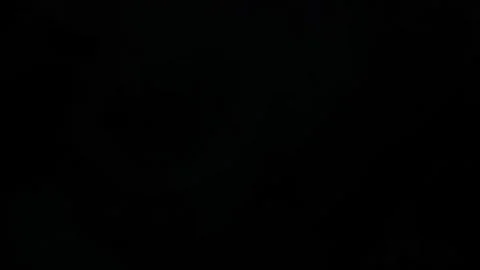 Dreamlike Mist Floating on Black Background, Ethereal Fog Motion Overlay in 4K Stock Footage 334812532