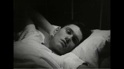 Dreams appear above Dick York's head - 1945 Stock Footage 101407424