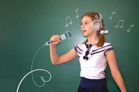 Dreams concept of a schoolgir Stock Photos