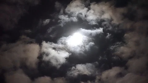Dreams moon on night sky on cloudy day between volume fluffy clouds. Video stock 108016668
