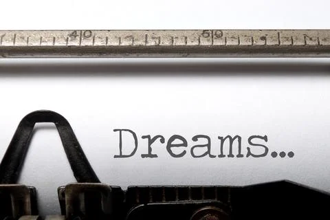 Dreams printed on an old typewriter Stock-Fotos