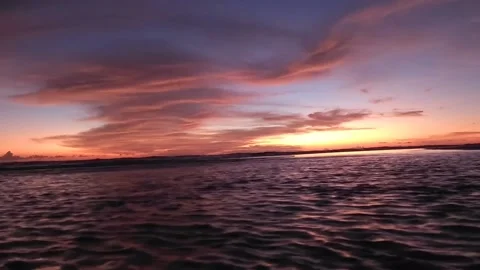 Dreamy Beachscape: A Romantic Sunset Timelapse Stock Footage 236570356