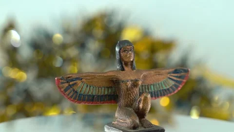 Dreamy close-up shot of a Cleopatra statue with wide open wings, hazy Stock Footage 259639002