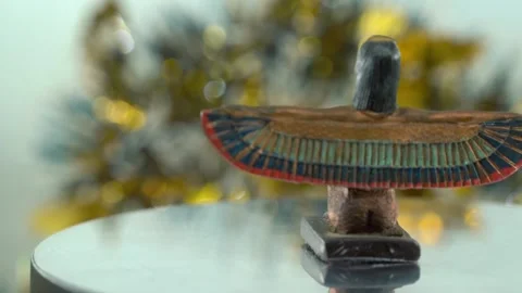 Dreamy close-up shot of a Cleopatra statue with wide open wings, hazy Stock Footage 259639077