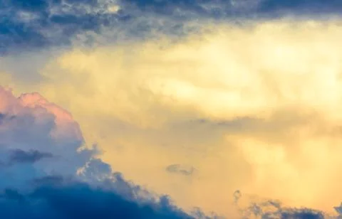 Dreamy clouds at sunset Stock Photos