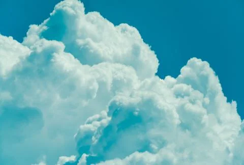 Dreamy clouds at sunset Stock Photos