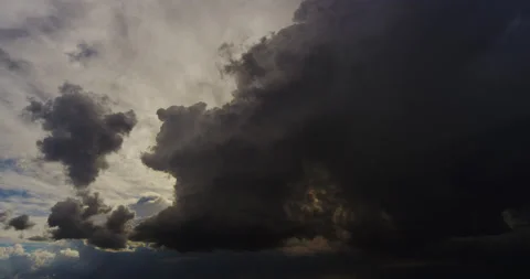 Dreamy cloudscape in a desert sky during a developing monsoon storm event. Video stock 234024569