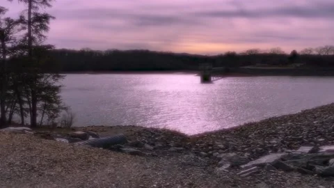 Dreamy effect Blue Ridge Dam Toccoa River silhouette of tree line tilt up to  Stock Footage 149602824