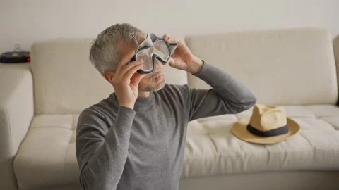 Dreamy man having fun packing suitcase Video stock 133524858