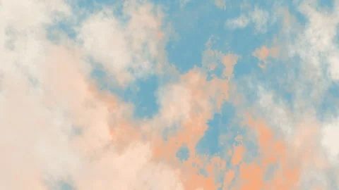 A dreamy sky with a soft blend of blue, white, and peach clouds Stock Footage 306231573