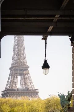 Dreamy spring Eiffel Tower from the metro bridge Bir Hakeim - Paris Stock Photos