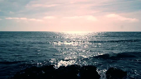 Dreamy stone beach at sunset Stock-Footage 49040138