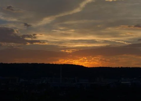 Dreamy sunset colours in thuringia with clouds at summer Stock Photos