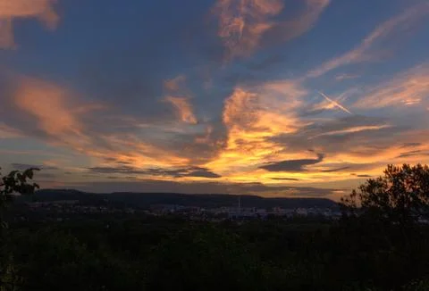 Dreamy sunset colours in thuringia with clouds at summer Stock Photos