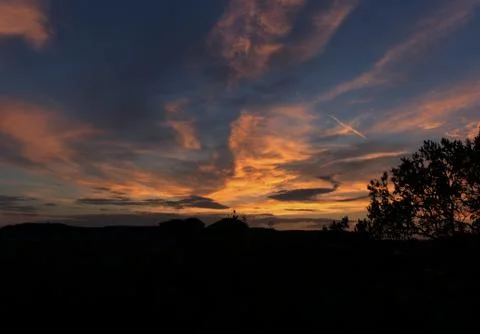 Dreamy sunset colours in thuringia with clouds at summer Stock Photos