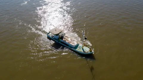 Dredge barge, removing river sand. Stock Photos