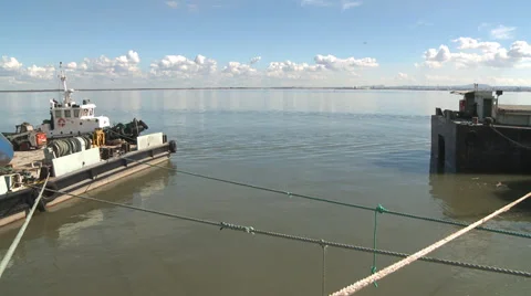 Dredge barges in harbor time lapse Stock Footage 34735887