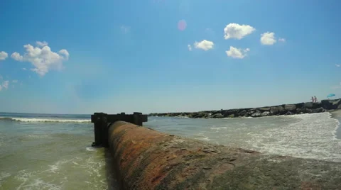 Dredge Pipe On Beach Stock Footage 61627997