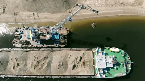 A dredger is dragging sand to the shore from a scow Video stock 142073095