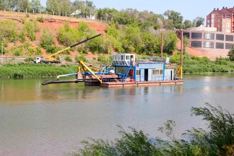 Dredger. Dredging on the river Stock Photos
