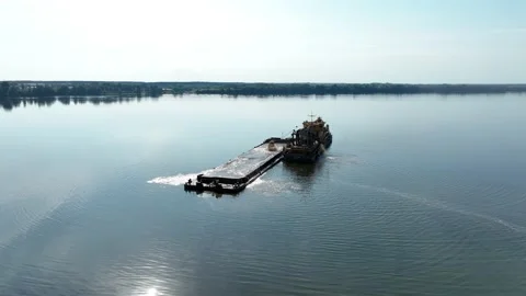 A dredger for extracting river sand and cleaning the river bottom. Stock Footage 220980182