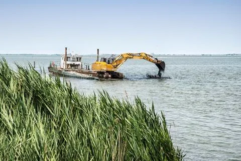 Dredger on the river Stock Photos