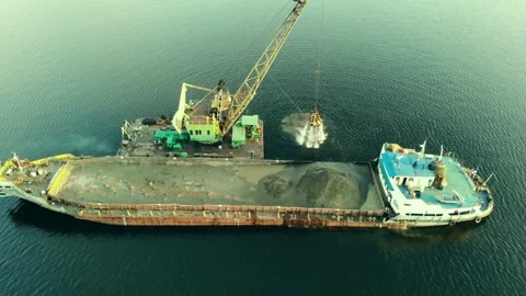 A dredger works in the middle of the river. Stock Footage 142072508