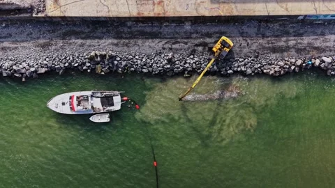 Dredging boat and excavator working at Port of Burgas Stock Footage 338187144