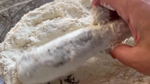 Dredging Eggplant in Flour Video stock 345305227