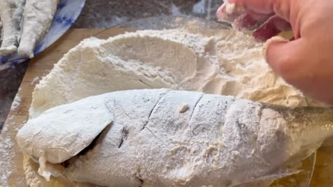 Dredging Fish in Flour Stock Footage 345305382