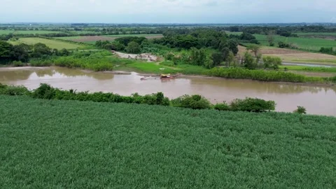 Dredging Machinery Operating in the Cauca River Seen From Drone Stock Footage 310701423