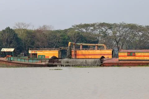 Dredging on muhuri river. Stock Photos