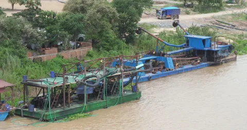 Dredging pumping equipment is used to pump the fluidized sand off the barge  Stock Footage 251147964