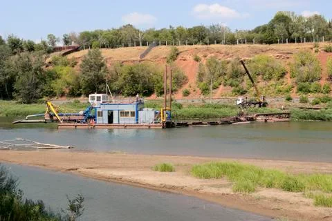 Dredging on the river Stock Photos