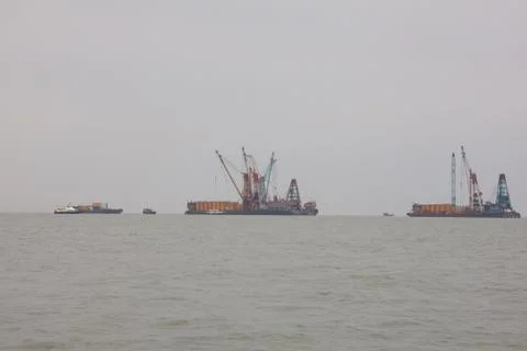 Dredging on sea Stock Photos