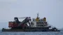 Dredging ship near the coastline of Flores Indonesia 4k or 4k+ Resolution