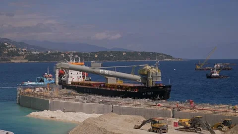 Dredging Vessel in Action – Sand Pumping at Construction Port Site in 4K Stock Footage 313525598