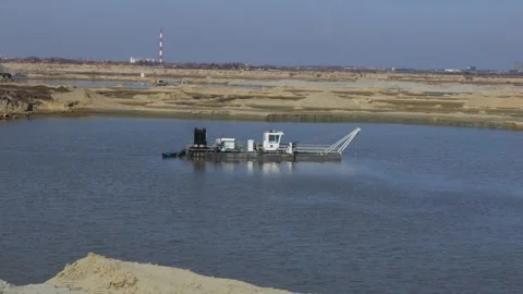 Dredging vessel sand mining using suction pump Stock Footage 303998640