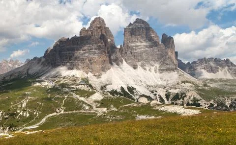 Drei Zinnen or Tre Cime di Lavaredo with green meadow and beautiful sky, Sext Stock Photos