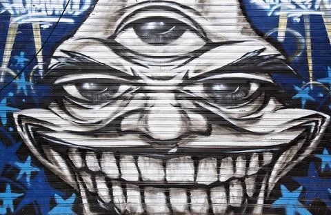  Dreiauge Graffito eines grinsenden Gesichtes mit 3 Augen, Chiang Mai, Tha... Stock Photos