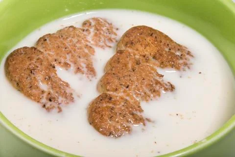 Drench biscuits in a cup for breakfast Stock Photos