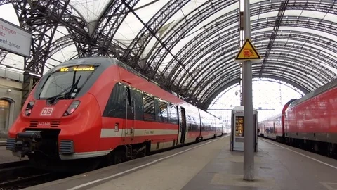 Dresden, Germany - December, 2017: Train Station. Trains parked at last stop Stock Footage 83380348