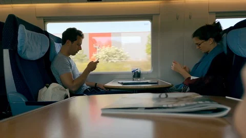 DRESDEN, GERMANY - MAY 2, 2018. Young couple using the smartphones while Video stock 89997944