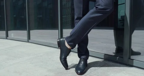 Dress code of a real business-man wearing a darkblue suit Video stock 141909317