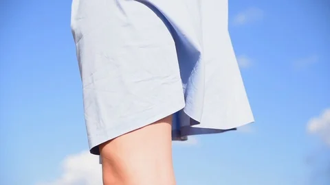 Dress fluttering in the wind Stock Footage 98424914