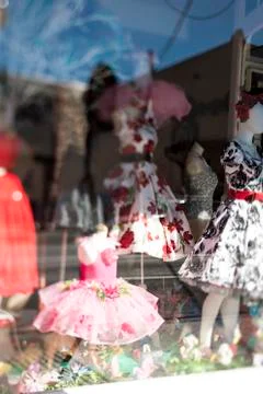Dress shop window display reflection retail female. Stock Photos